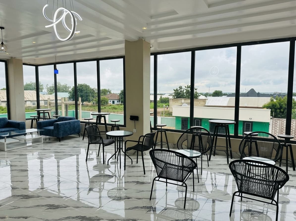 Dining room at Equal Restaurant in Tamale with neatly arranged tables and comfortable chairs