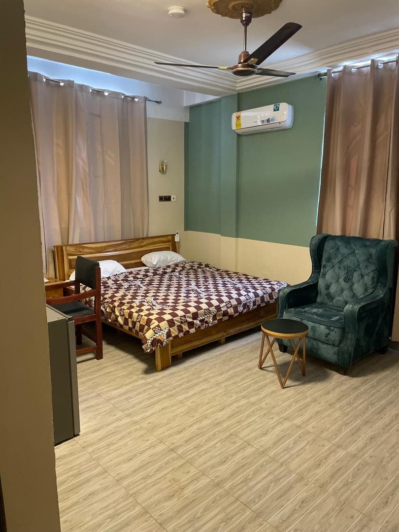 Deluxe Room guestroom at Equal Hotel Tamale